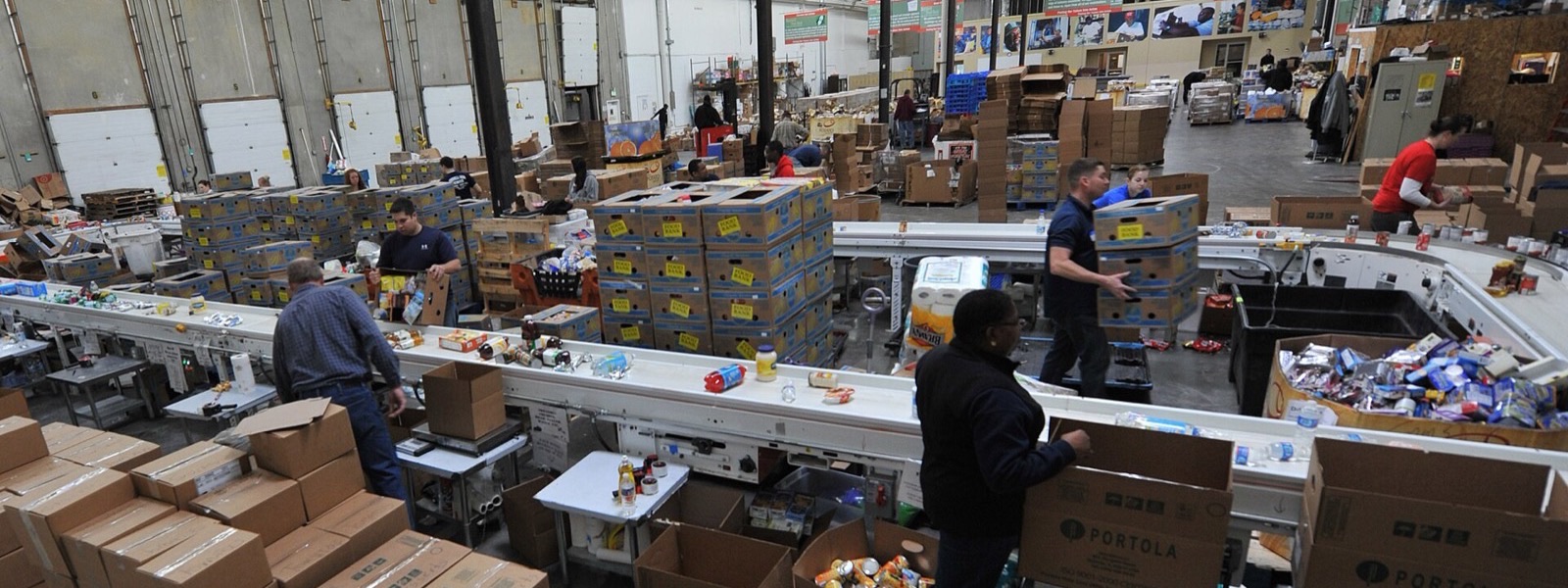 Volunteers assist at a food bank