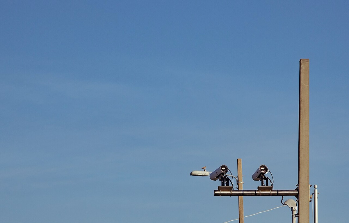 License plate reader cameras mounted on a pole in Pensacola, Florida. The photo is a file image and does not show St. Johns County cameras.